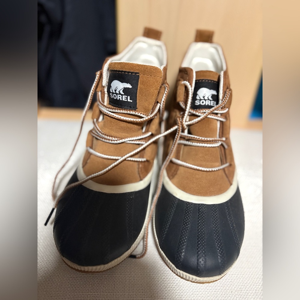 Sorel Tan and Black Rain Boots